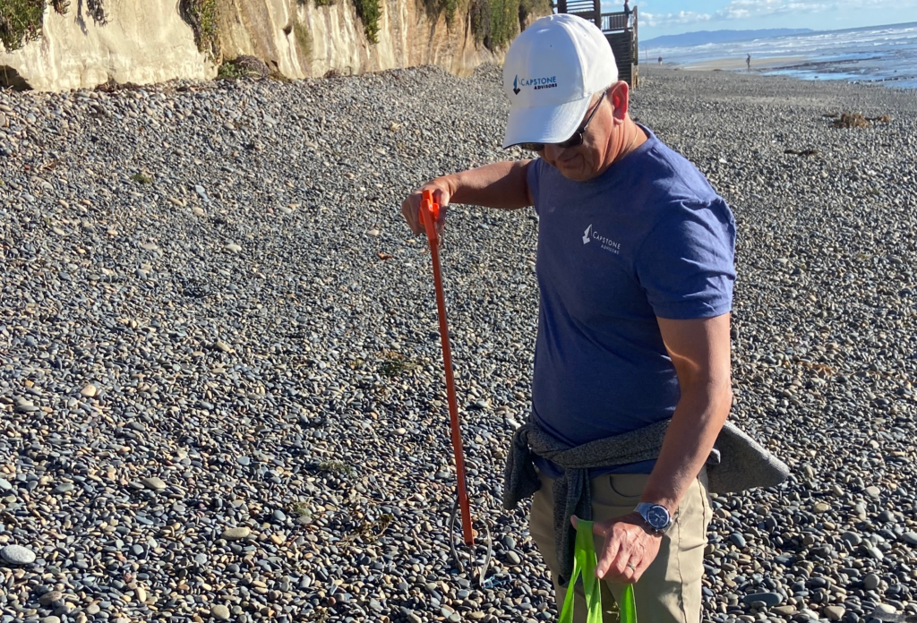 Capstone Advisors and Surfrider Foundation beach cleanup at Ponto Beach